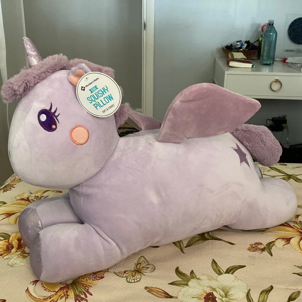 Giant unicorn squish pillow